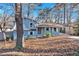 Newly painted light blue house with a spacious front yard at 2080 Bluffton Way, Decatur, GA 30035