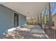 Covered porch with metal railings overlooking the backyard at 2080 Bluffton Way, Decatur, GA 30035