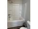 Clean bathroom featuring a shower/tub combo and neutral color palette at 253 Ivey Ter # 48, Temple, GA 30179