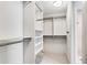 Bright walk-in closet offering custom built-ins at 3630 Peachtree Ne Rd # 2408, Atlanta, GA 30326