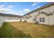 Large backyard with grassy area and view of neighboring townhomes at 45 Eagle Glen Ne Dr, Cartersville, GA 30121