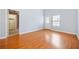 Bright bedroom with hardwood floors and access to a closet at 45 Eagle Glen Ne Dr, Cartersville, GA 30121
