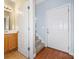 Entryway with hardwood floors, half bath, and stairs leading upstairs at 45 Eagle Glen Ne Dr, Cartersville, GA 30121