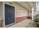 Townhome entrance with a dark-colored door and a small porch at 45 Eagle Glen Ne Dr, Cartersville, GA 30121