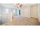 Spacious loft area with neutral carpeting and ceiling fan at 45 Eagle Glen Ne Dr, Cartersville, GA 30121