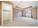 Main bedroom with carpeted floors and ceiling fan at 45 Eagle Glen Ne Dr, Cartersville, GA 30121