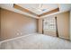 Main bedroom with carpeted floors and ceiling fan at 45 Eagle Glen Ne Dr, Cartersville, GA 30121