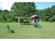Community playground with a playset and swings at 45 Eagle Glen Ne Dr, Cartersville, GA 30121