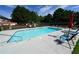 Inviting community pool with lounge chairs and patio at 45 Eagle Glen Ne Dr, Cartersville, GA 30121