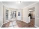 Charming dining room with hardwood floors and built-in window seat at 5521 Marbut Rd, Lithonia, GA 30058