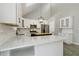 Renovated kitchen with white cabinets, stainless steel appliances, and an island at 4466 Whitecap Rd, Marietta, GA 30066