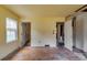 Unfinished room with hardwood floors and doors to other rooms at 1273 Anchor Sw Ter, Atlanta, GA 30311