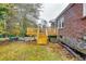 Wooden deck with stairs leading to the backyard at 1273 Anchor Sw Ter, Atlanta, GA 30311