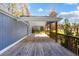 Spacious wooden deck with railings, providing ample outdoor space at 70 Caroline Ave, Stockbridge, GA 30281