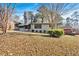 House with a large front yard and mature trees at 2142 Cloverdale Se Dr, Atlanta, GA 30316