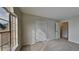 Bedroom with large window and double door closet at 3374 River Mill Ln, Ellenwood, GA 30294
