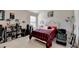 Bedroom with a bed, guitar, and lots of collectibles at 622 Madison Park Dr, Grayson, GA 30017