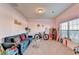 Bright living room with hardwood floors and an open floor plan at 622 Madison Park Dr, Grayson, GA 30017