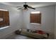 Unfinished bedroom with new flooring and ceiling fan at 1349 Cleveland Ave, Atlanta, GA 30344