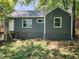 Rear view of charming gray house with landscaped yard at 1349 Cleveland Ave, Atlanta, GA 30344