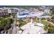 Aerial view of a city with a large shopping mall and surrounding buildings at 285 Centennial Olympic Park Nw Dr # 401, Atlanta, GA 30313