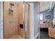 Walk-in shower with tiled walls and glass enclosure at 285 Centennial Olympic Park Nw Dr # 401, Atlanta, GA 30313