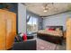 Main bedroom with king bed, city views, and ceiling fan at 285 Centennial Olympic Park Nw Dr # 401, Atlanta, GA 30313