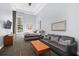 Spacious bedroom with a comfortable bed and a sitting area at 285 Centennial Olympic Park Nw Dr # 401, Atlanta, GA 30313