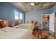 Bedroom with two beds, city views, and access to bar area at 285 Centennial Olympic Park Nw Dr # 401, Atlanta, GA 30313