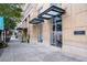 Modern building exterior showcasing retail space at street level at 285 Centennial Olympic Park Nw Dr # 401, Atlanta, GA 30313