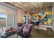 Common area with wet bar and artistic wall mural at 285 Centennial Olympic Park Nw Dr # 401, Atlanta, GA 30313