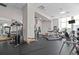Well-equipped fitness center with various cardio and weight training machines at 285 Centennial Olympic Park Nw Dr # 401, Atlanta, GA 30313