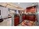 Open kitchen with stainless steel appliances and breakfast bar at 285 Centennial Olympic Park Nw Dr # 401, Atlanta, GA 30313
