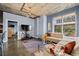 Spacious living room featuring large windows and comfortable seating at 285 Centennial Olympic Park Nw Dr # 401, Atlanta, GA 30313