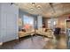 Tan couches and large windows in this open living room at 285 Centennial Olympic Park Nw Dr # 401, Atlanta, GA 30313