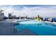 Enjoy rooftop pool with ample lounge chairs and city views at 285 Centennial Olympic Park Nw Dr # 401, Atlanta, GA 30313