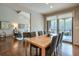 Bright dining room with hardwood floors and deck access at 4048 Columns Dr, Marietta, GA 30067