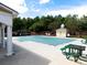 Community pool with covered patio and seating at 98 Hill Side Way, Hiram, GA 30141