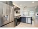 Modern kitchen with stainless steel appliances and dark cabinetry at 2218 Goodwood Se Blvd, Smyrna, GA 30080