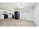 Bright eat in kitchen with white cabinets and black appliances at 2825 Battlecrest Dr, Decatur, GA 30034