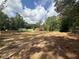 Wooded lot ready to build your dream home on. Partially cleared with a view of neighboring homes at 1581 Cheryl Leigh Dr, Riverdale, GA 30296