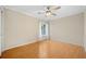 Spacious bedroom with hardwood floors and ceiling fan at 3623 Stonewall Se Ct, Atlanta, GA 30339