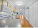 Well-lit kitchen featuring light wood cabinets and granite countertops at 3623 Stonewall Se Ct, Atlanta, GA 30339