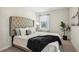 Cozy bedroom with a comfortable bed and natural light at 318 Crimson Dr, Union City, GA 30291