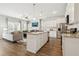 Open concept kitchen with island, stainless steel appliances, and hardwood floors at 318 Crimson Dr, Union City, GA 30291