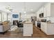 Modern kitchen with white cabinets, granite countertops, and stainless steel appliances at 318 Crimson Dr, Union City, GA 30291