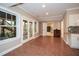 Basement space with tile floors, French doors, and access to another living area at 201 Big Meadows Ct, Canton, GA 30114