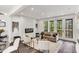 Open living room with fireplace and access to balcony at 1832 Gotham Ln, Atlanta, GA 30324