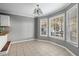 Charming breakfast nook boasts a bay window and tile floors at 520 Salem Woods Se Dr, Marietta, GA 30067