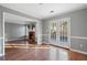 Bright dining area with hardwood floors and access to patio at 520 Salem Woods Se Dr, Marietta, GA 30067